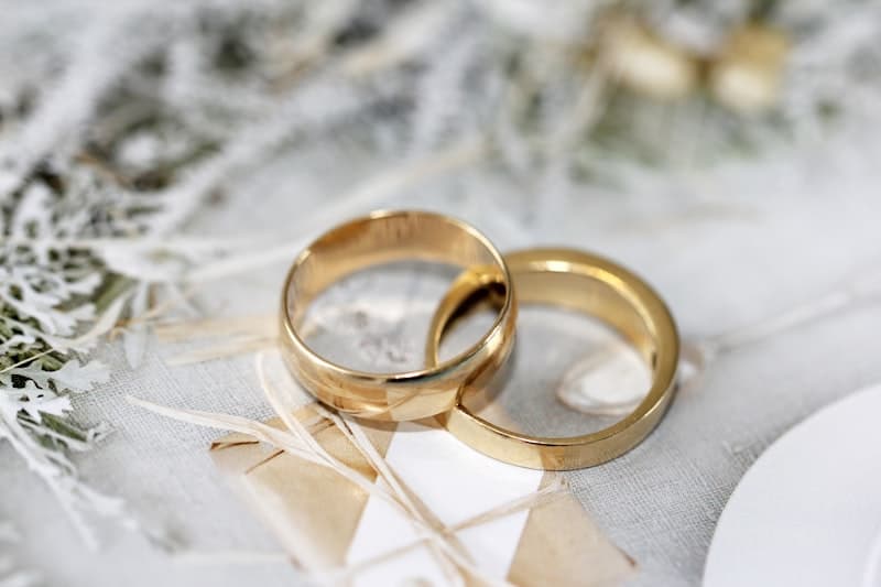 A couple exchanging vows at an outdoor garden wedding ceremony